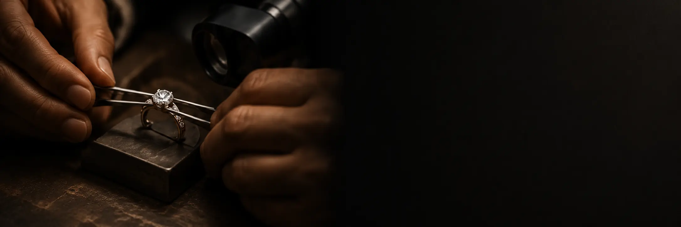Master jeweller working carefully on a diamond ring.